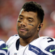Image for article titled Russell Wilson Wants To Clarify What His Scam Water Can Do For Concussions